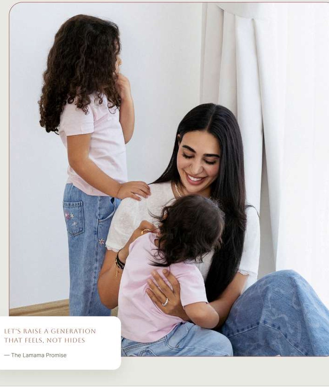 Lama, founder of Lamama, sitting with her two children